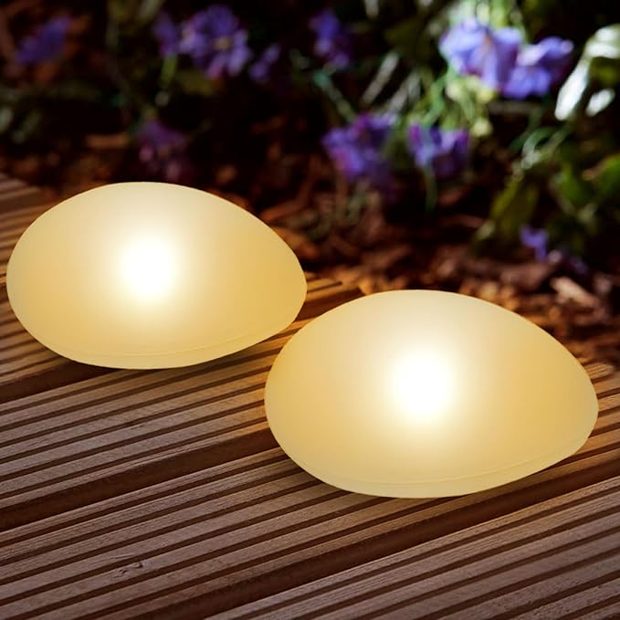 SUNNYPARK Solar Garden Lights Outdoor Set of 4 Plastic Pebble Shape Decorative Rock Lights Waterproof - Warm White SUNNYPARK