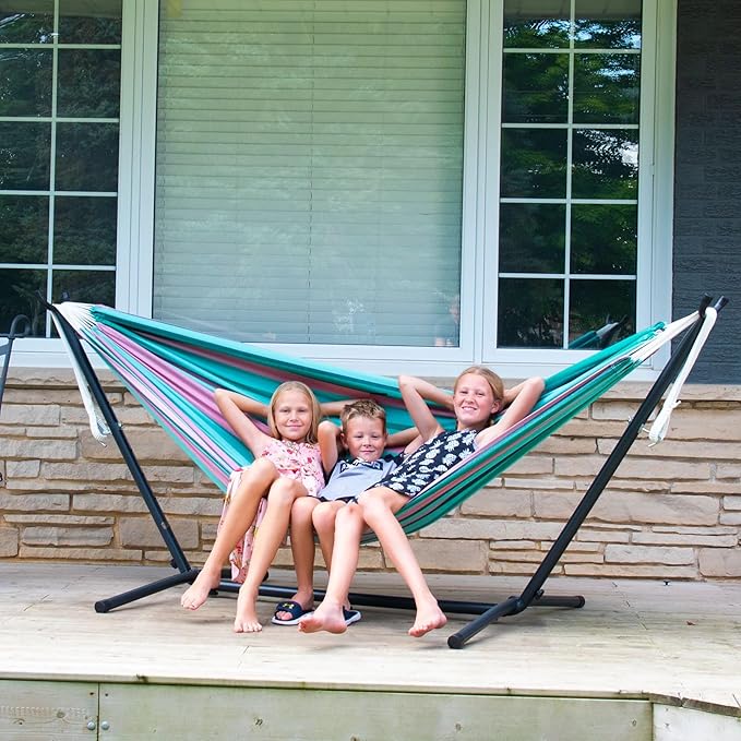 Vivere Double Cotton Hammock with Space Saving Steel Stand, Upgraded Polyester End Strings 450 lb Capacity - Premium Carry Bag Included - USA Grown Cotton (Watermelon) Vivere