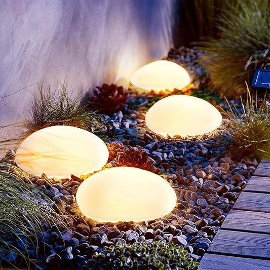 SUNNYPARK Solar Garden Lights Outdoor Set of 4 Plastic Pebble Shape Decorative Rock Lights Waterproof - Warm White SUNNYPARK