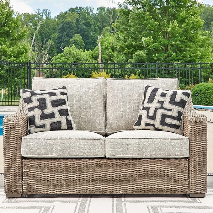 Signature Design by Ashley Beachcroft Casual Nuvella Weather Resistant Fabric, Resin Wicker Outdoor Loveseat with Cushion and 2 Accent Pillows, Dark Brown & Beige SignatureDesignbyAshley